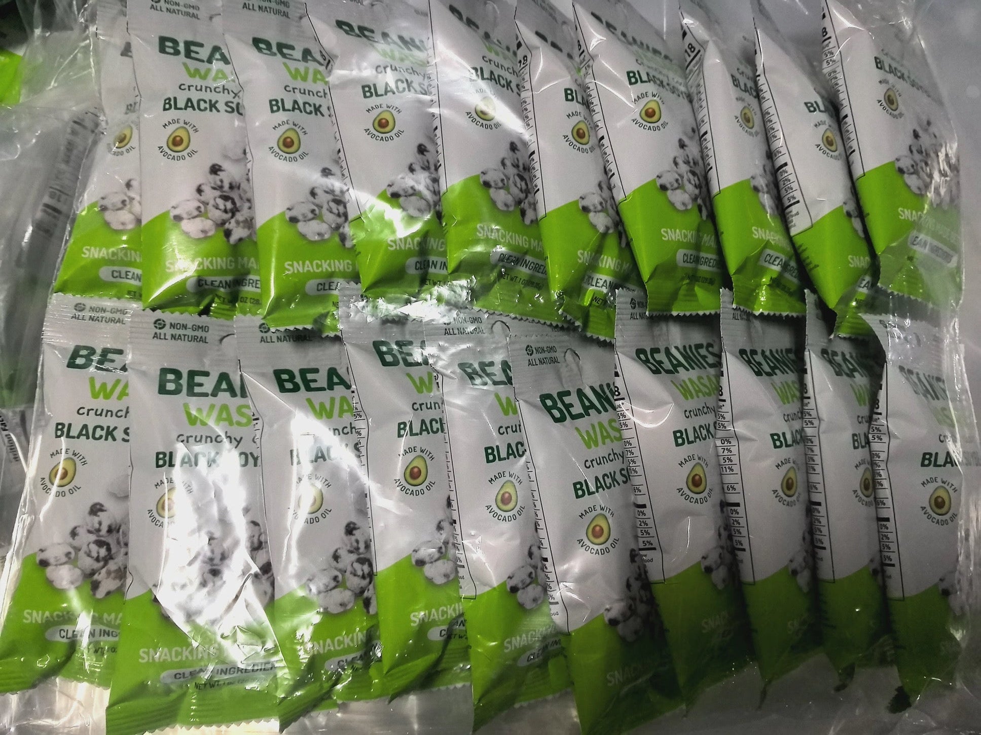 packages of wasabi flavored crunchy coated black soybean snacks